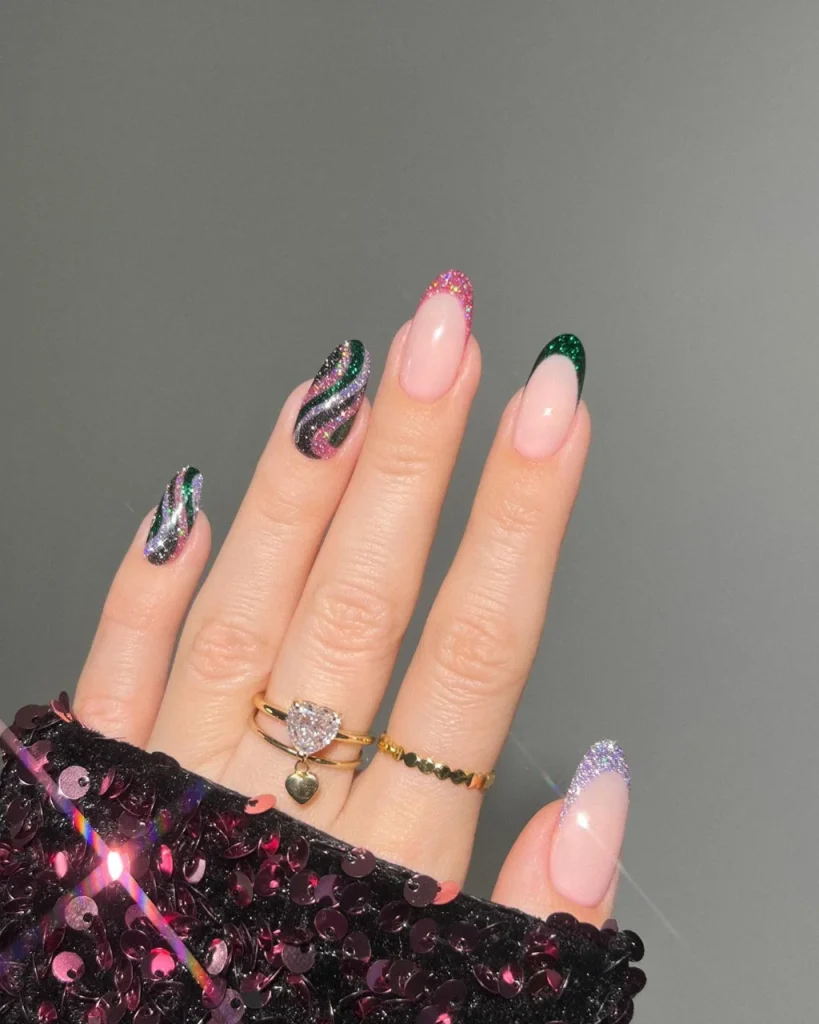 Baby pink Christmas nails with pastel pink and soft green French tips and delicate ribbon-inspired gift-wrap nail art.