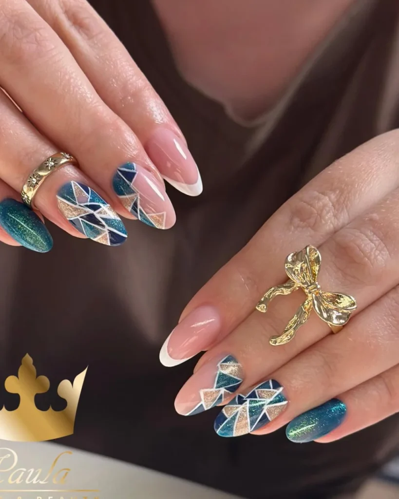 Blue and green Christmas nail designs with gold glitter geometric patterns, white outlines, and elegant French tips on almond-shaped nails.