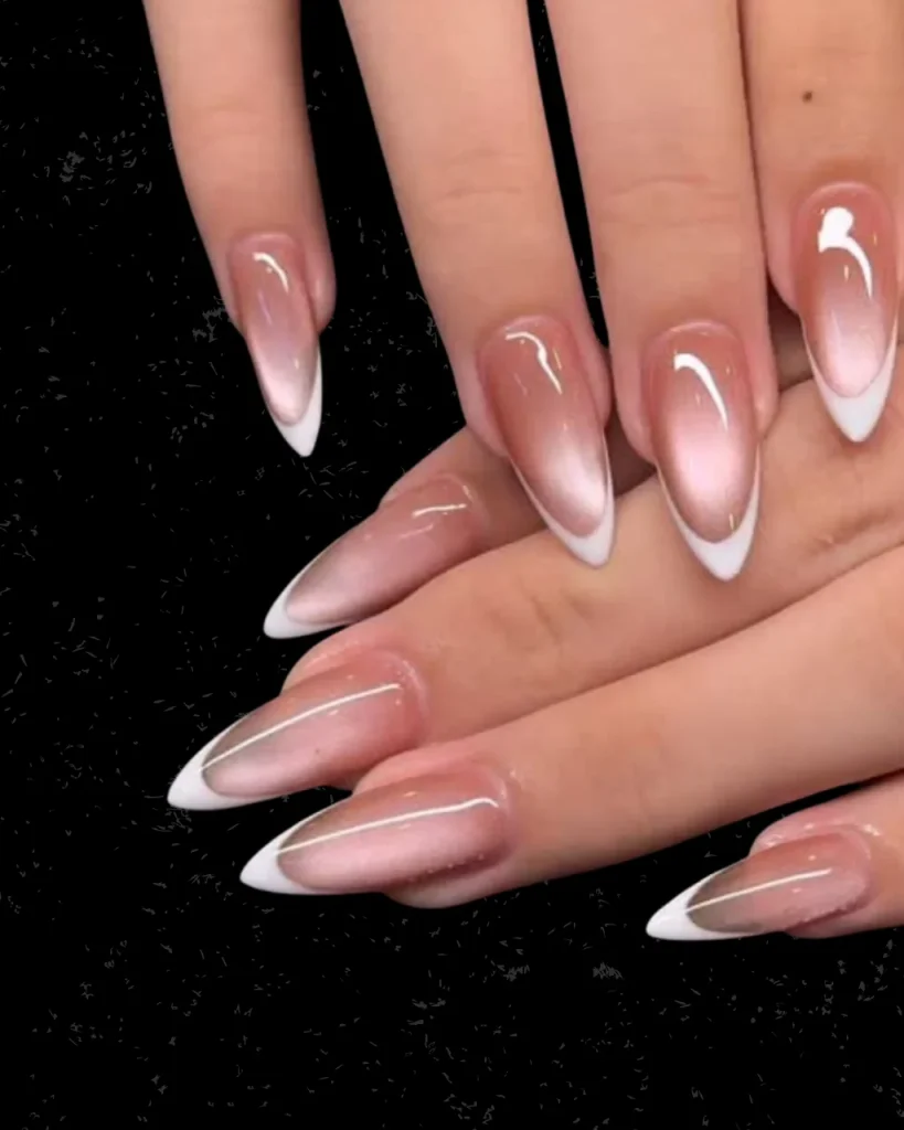 Soft pink chrome almond nails with glossy white French tips, perfect for white french tip christmas nail designs.
